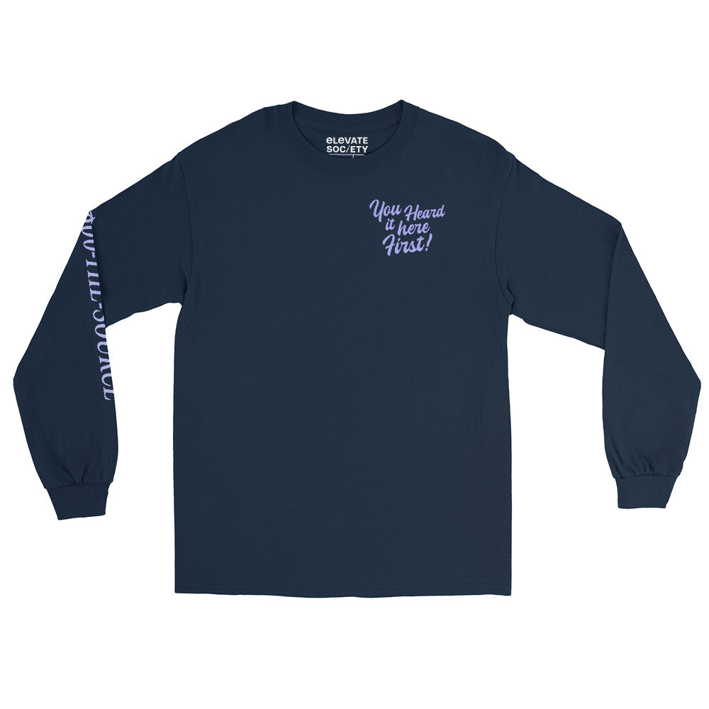 This shirt is made with 100% cotton for a soft, comfortable feel. A graphic design featuring the phrase ‘You Heard It Here First!’ is printed on the front and back. '1-800-THE-SOURCE' is printed on the right sleeve.