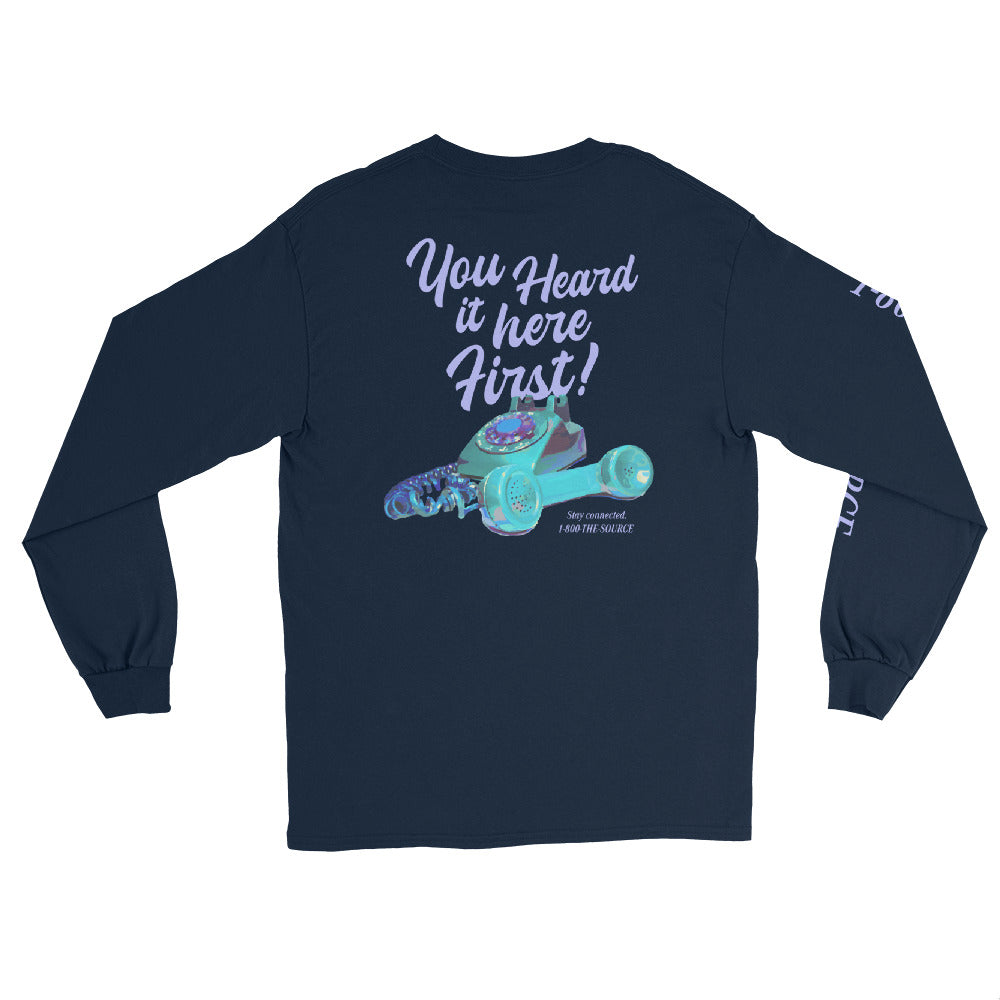 This shirt is made with 100% cotton for a soft, comfortable feel. A graphic design featuring the phrase ‘You Heard It Here First!’ is printed on the front and back. '1-800-THE-SOURCE' is printed on the right sleeve.