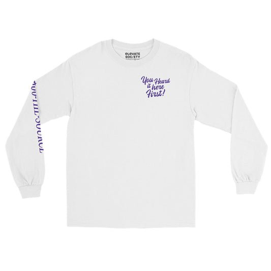 This shirt is made with 100% cotton for a soft, comfortable feel. A graphic design featuring the phrase ‘You Heard It Here First!’ is printed on the front and back. '1-800-THE-SOURCE' is printed on the right sleeve.